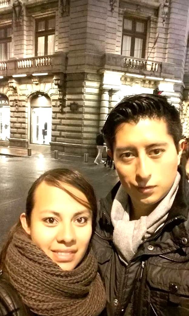 Two team members at night in downtown Mexico City.