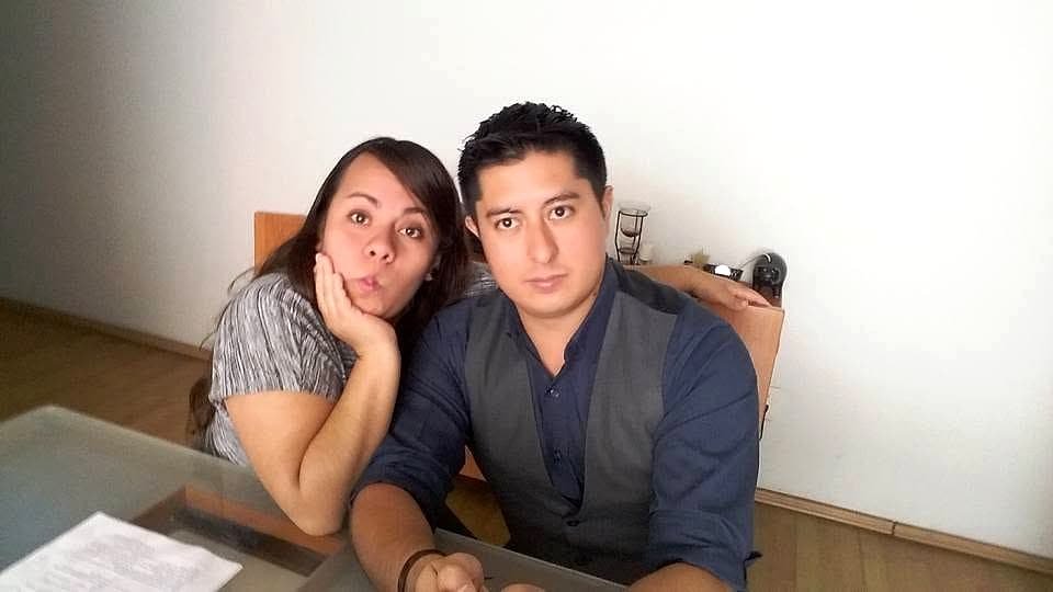 Two team members at the office, relaxed.