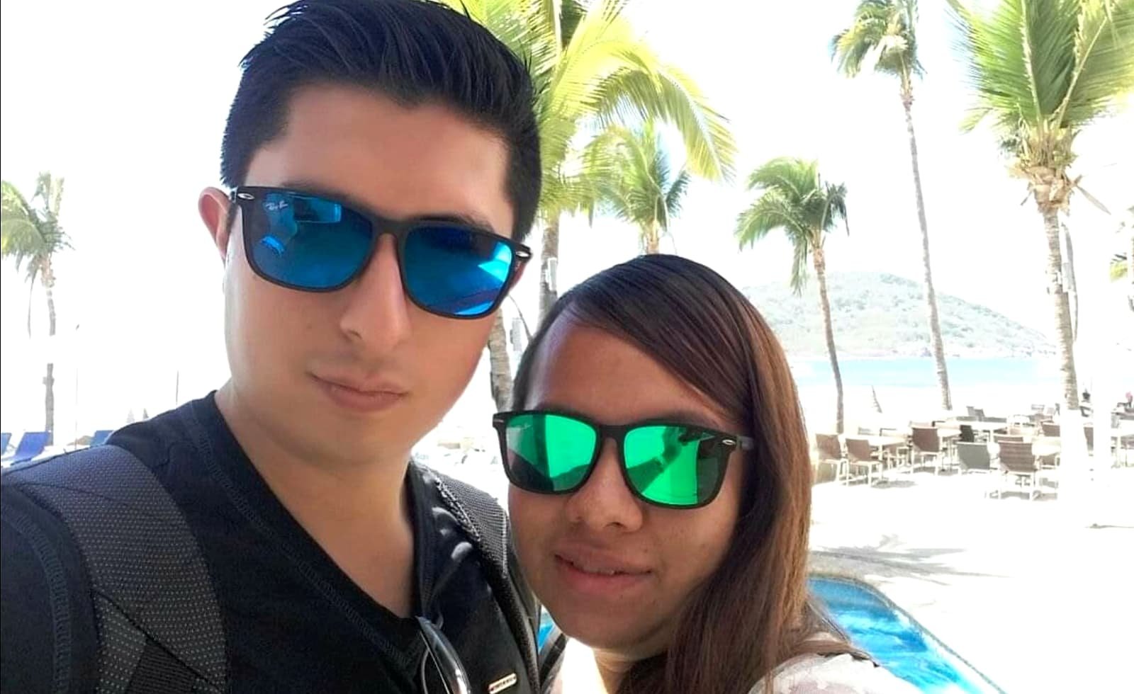 Two team members on a trip to the beach.